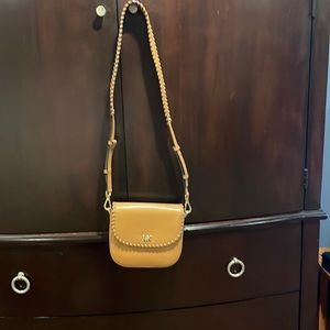Cute Michael Kors cross body with stitching.